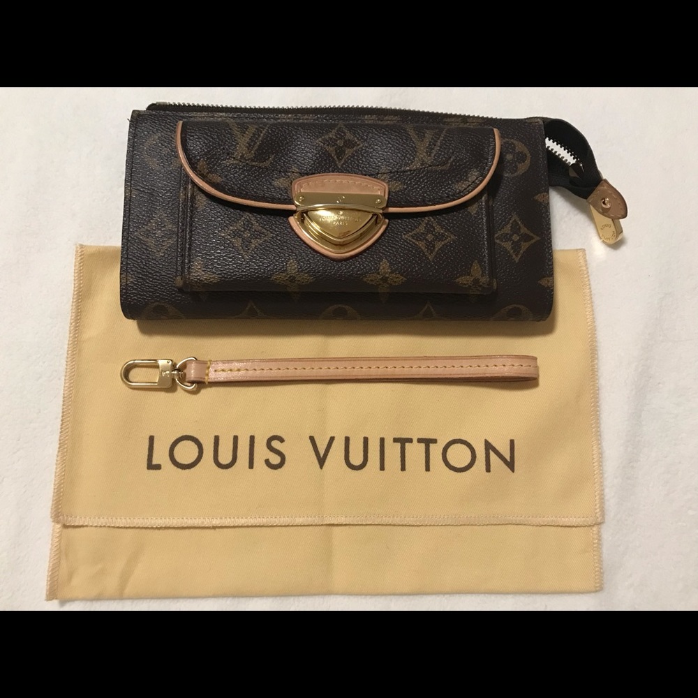 Louis Vuitton wallet with wristlet attachment